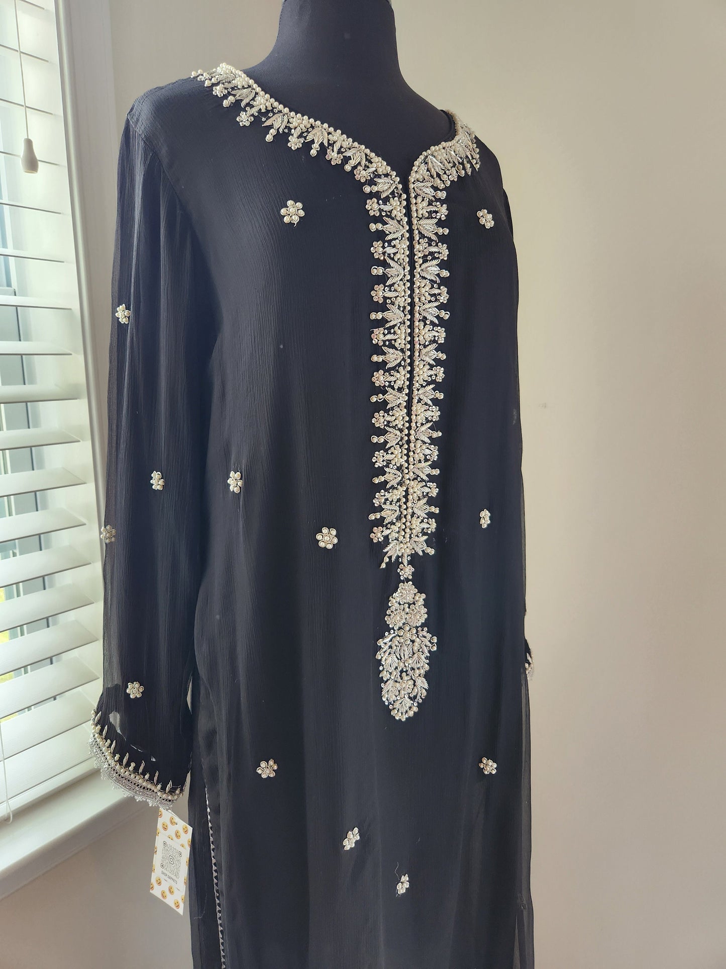 Black chiffon with silver kora dabka pearl handwork. Size large .