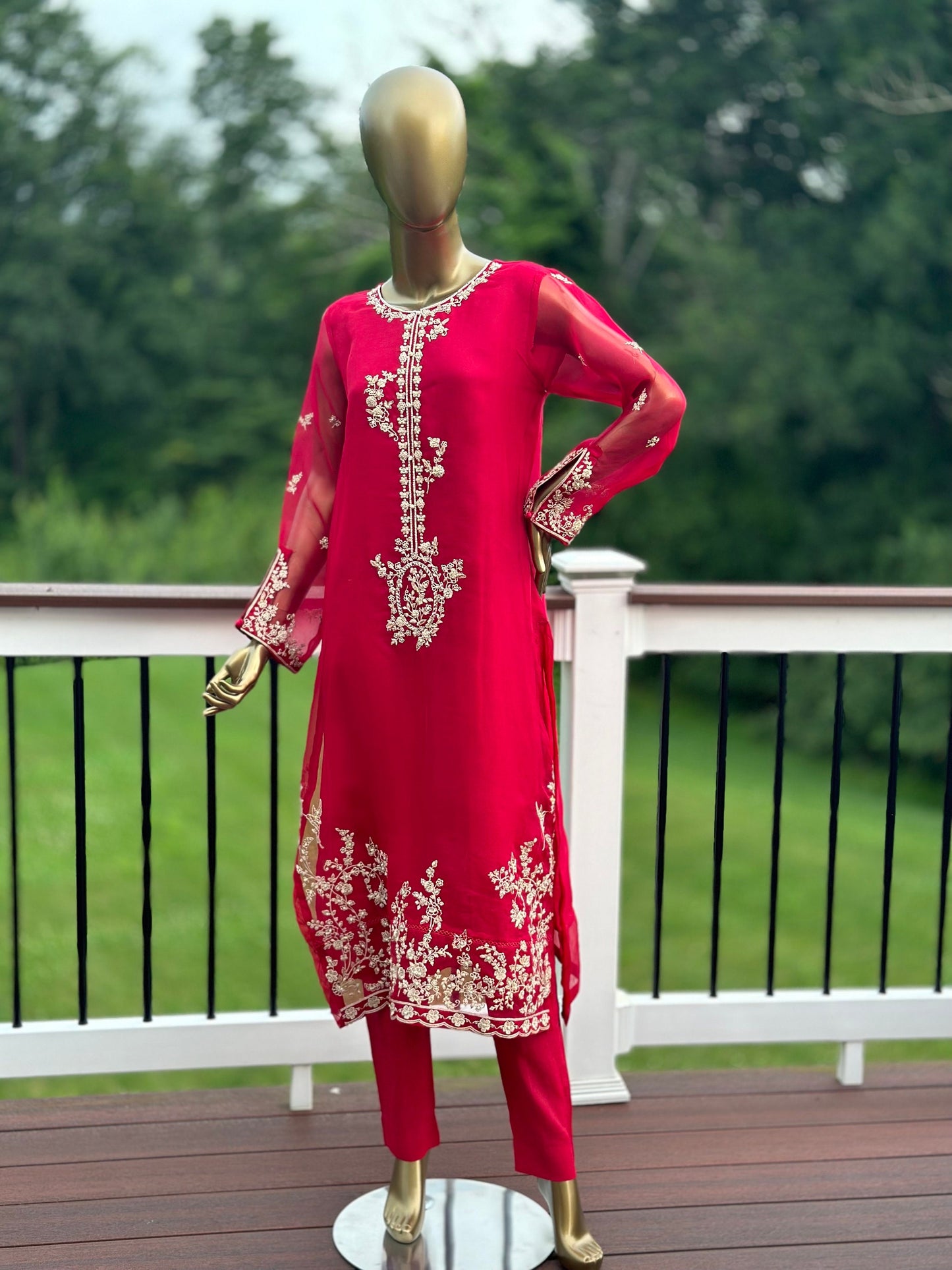 Red agha noor. Three piece pure organza shirt with silk duppata and silk pants.