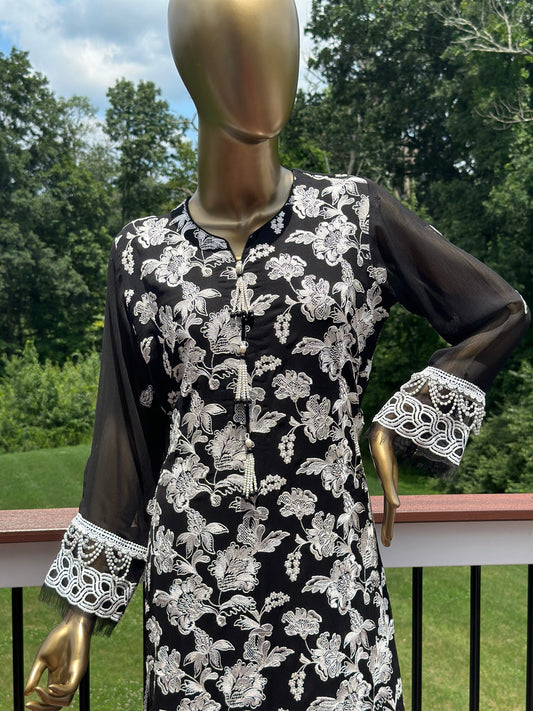 Black and white chikankari on pure chiffon.