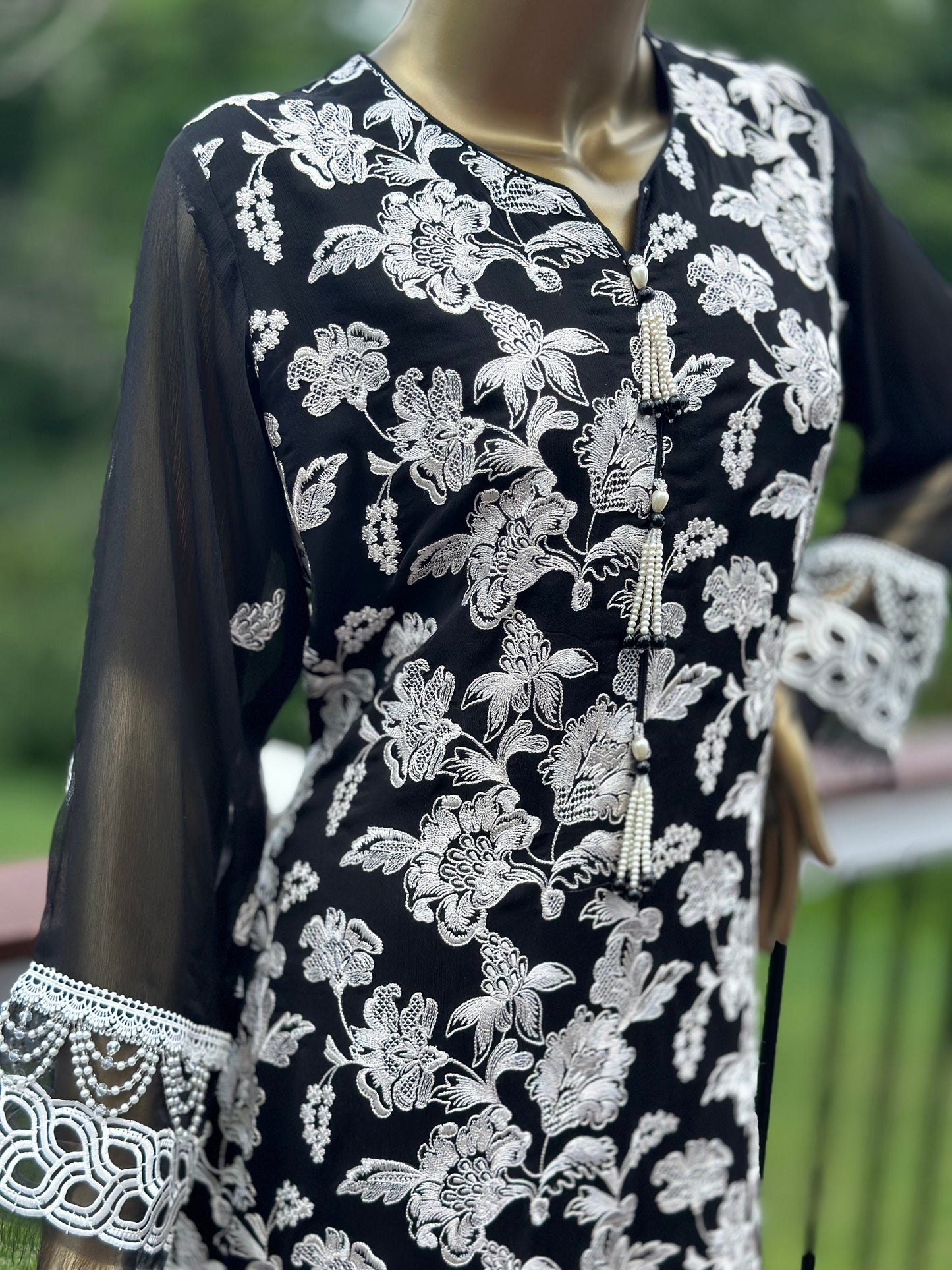 Black and white chikankari on pure chiffon.