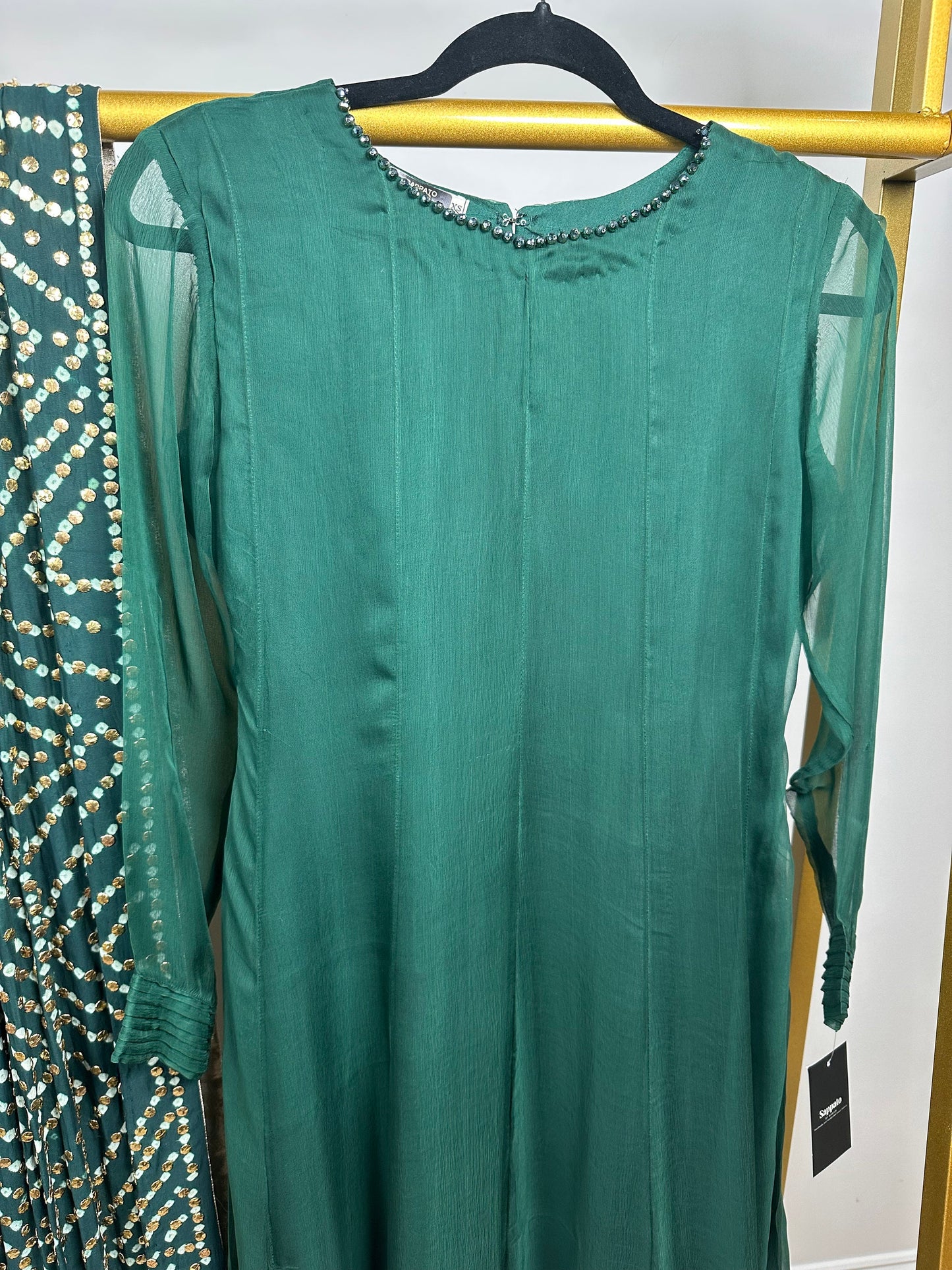 Green chiffon shirt and pants with heavy duppata.