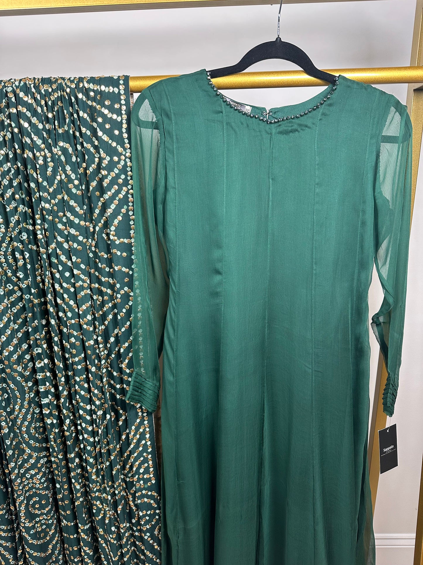 Green chiffon shirt and pants with heavy duppata.