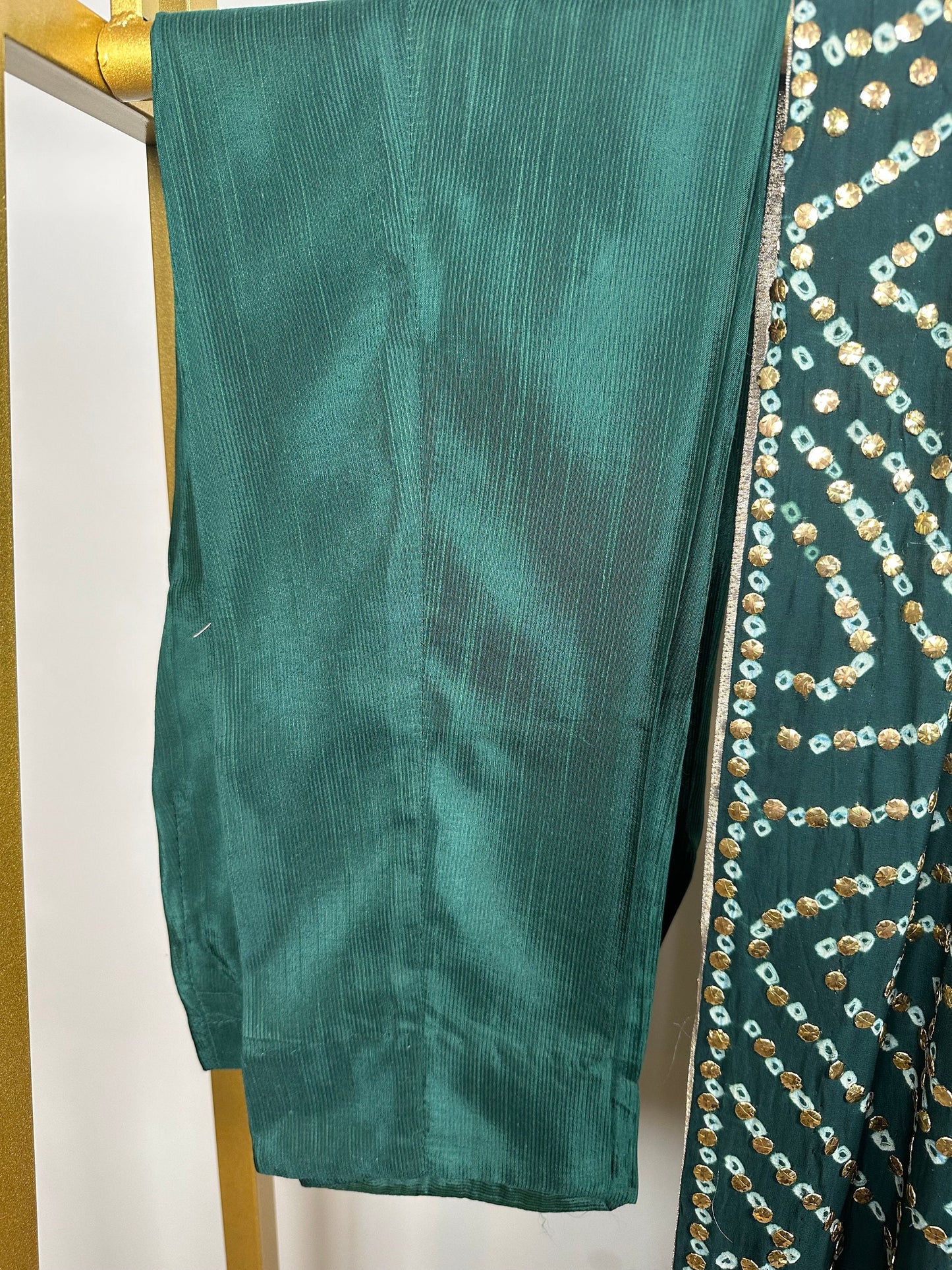 Green chiffon shirt and pants with heavy duppata.