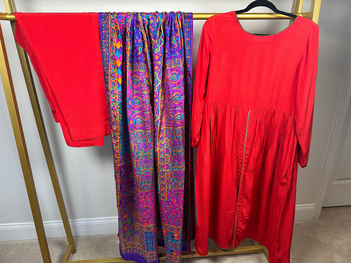 Red front open frock style shirt and pant with multicolored silk duppata.