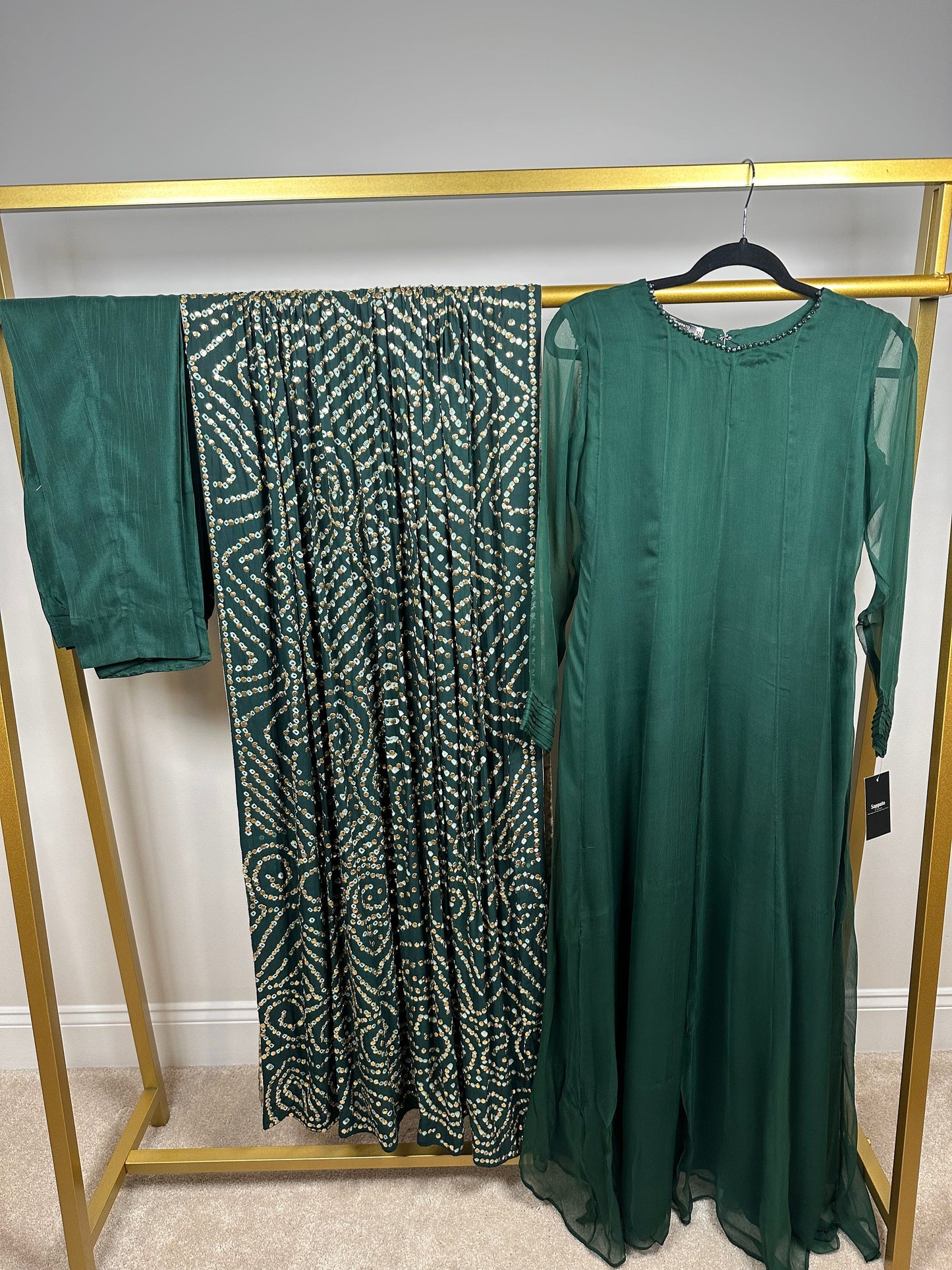 Green chiffon shirt and pants with heavy duppata.