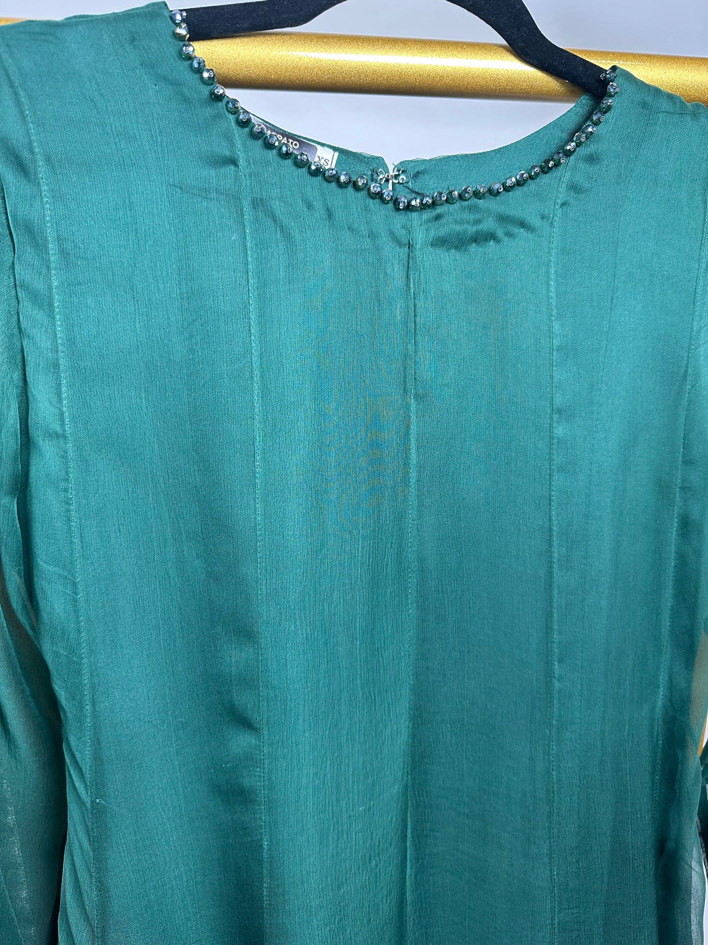 Green chiffon shirt and pants with heavy duppata.