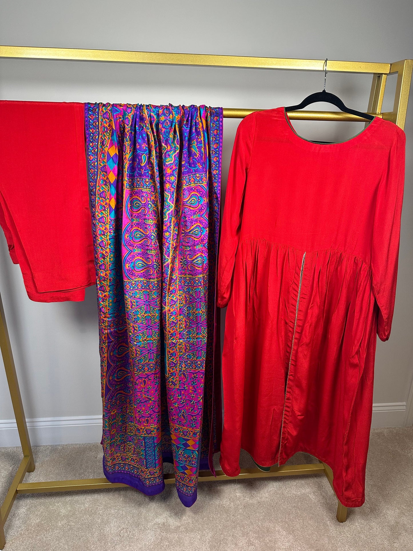 Red front open frock style shirt and pant with multicolored silk duppata.