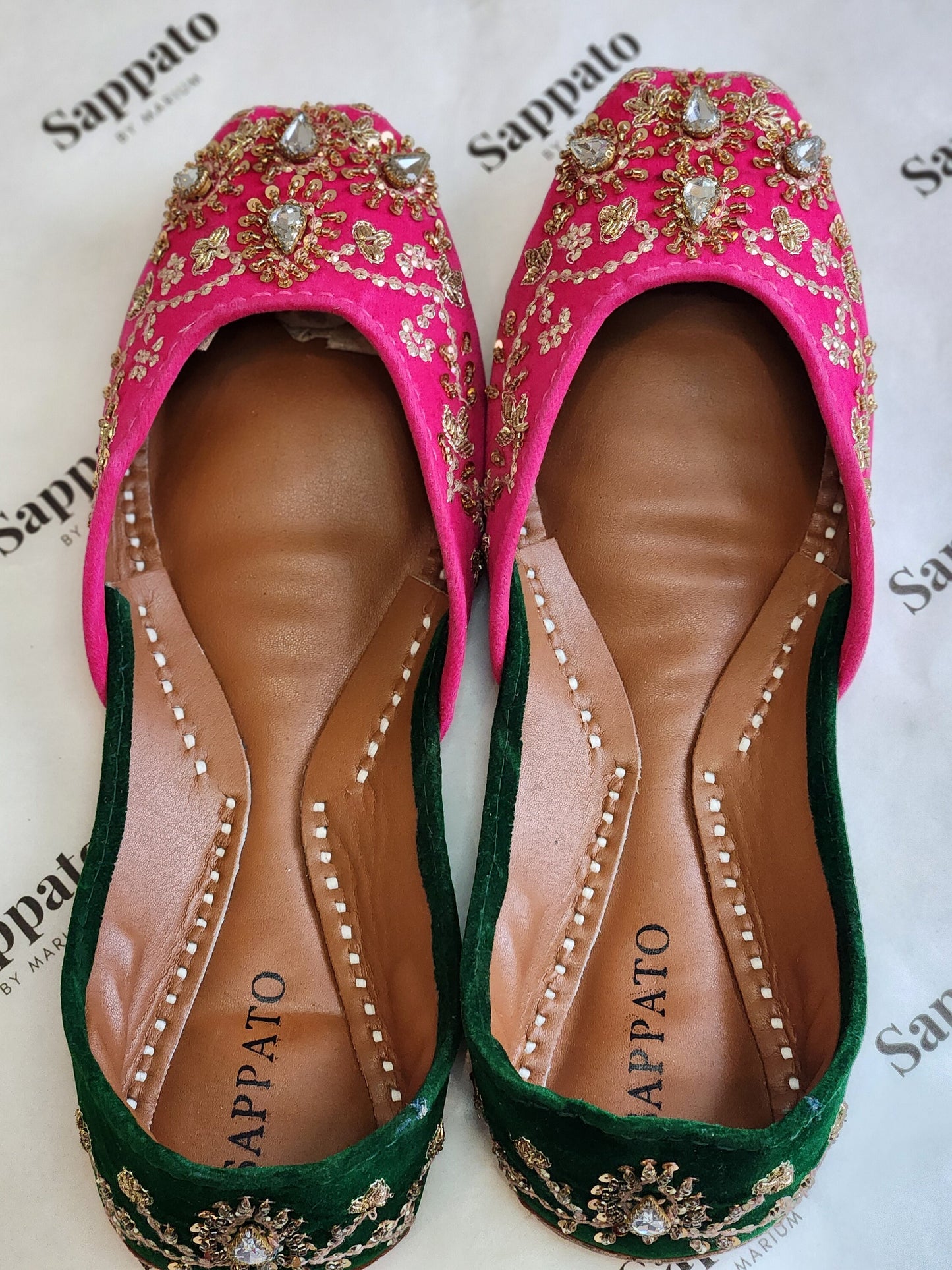 Pink and green velvet khussa.