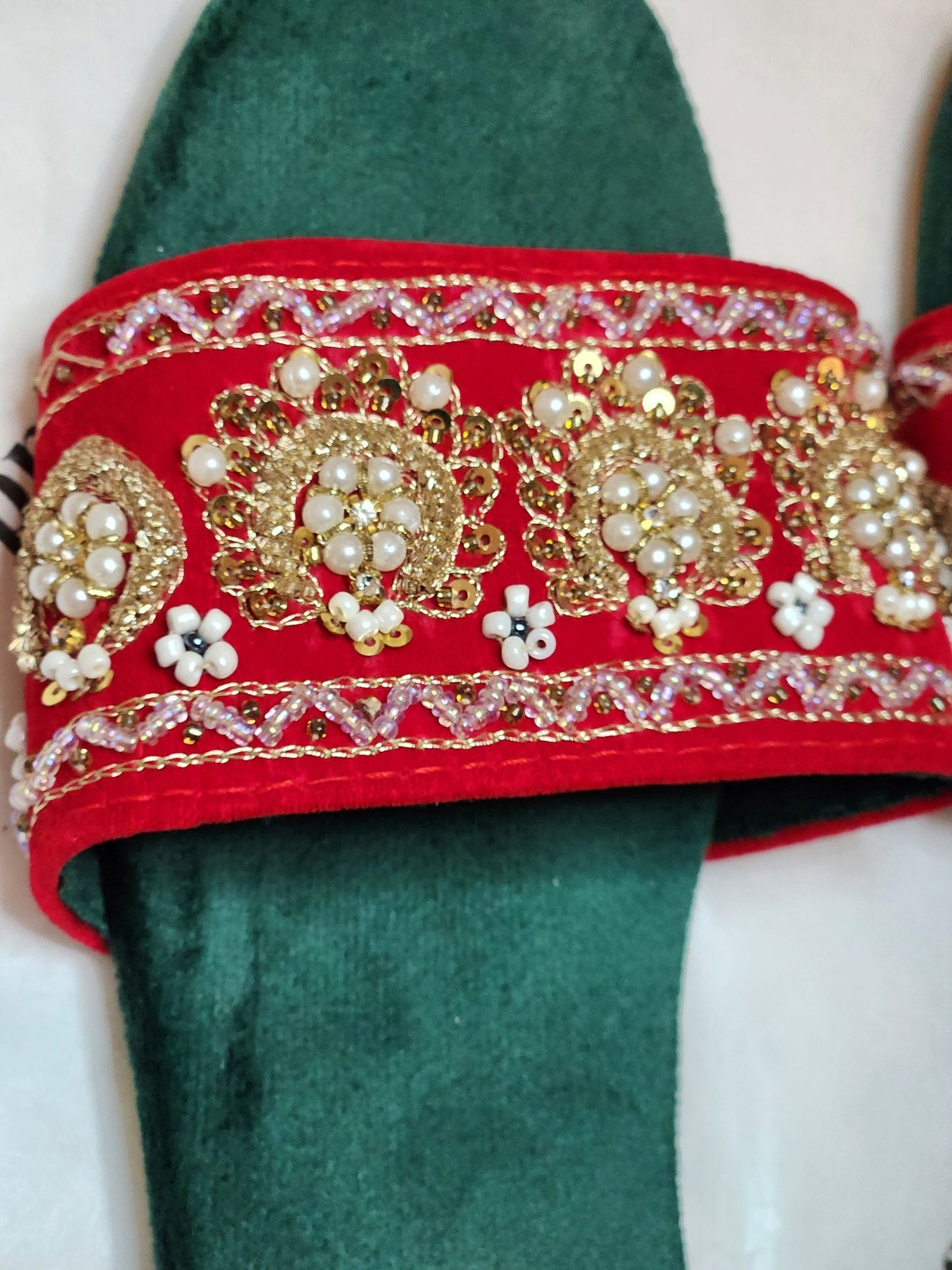 Maharani red chappal.