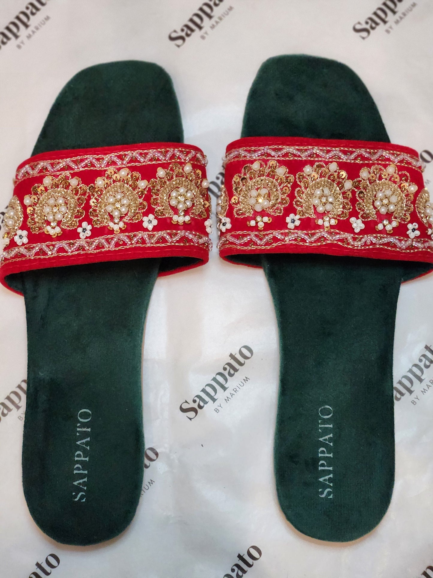 Maharani red chappal.