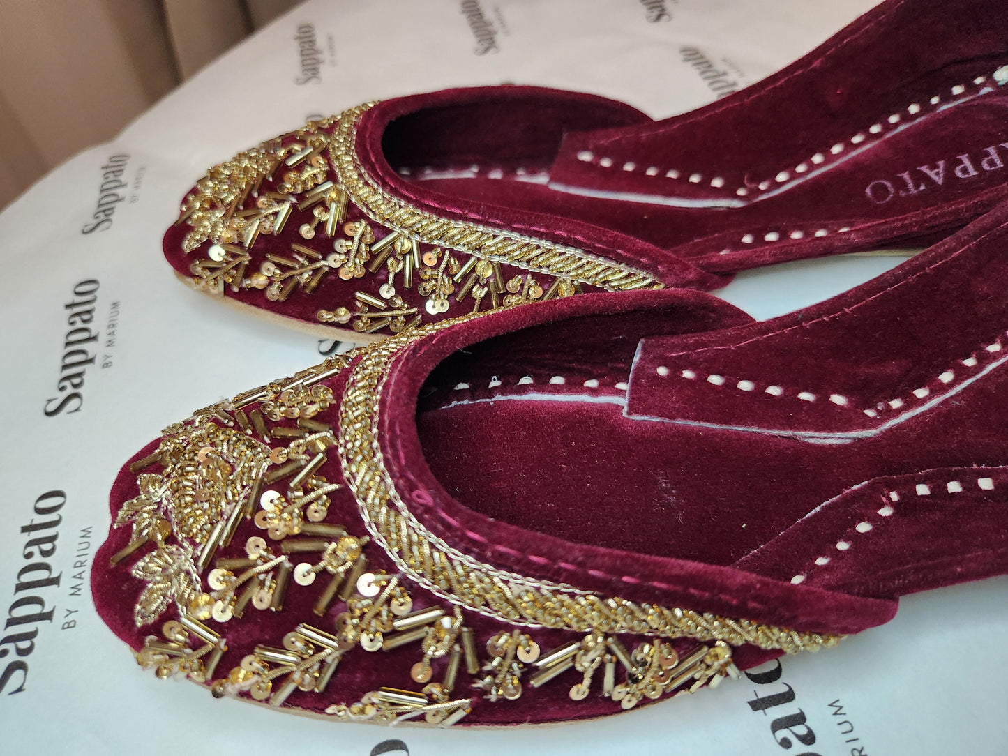 This beautiful Khussa with golden embroidery on a rich maroon velvet base will definitely be a head turner. Complete your look with Paisley.