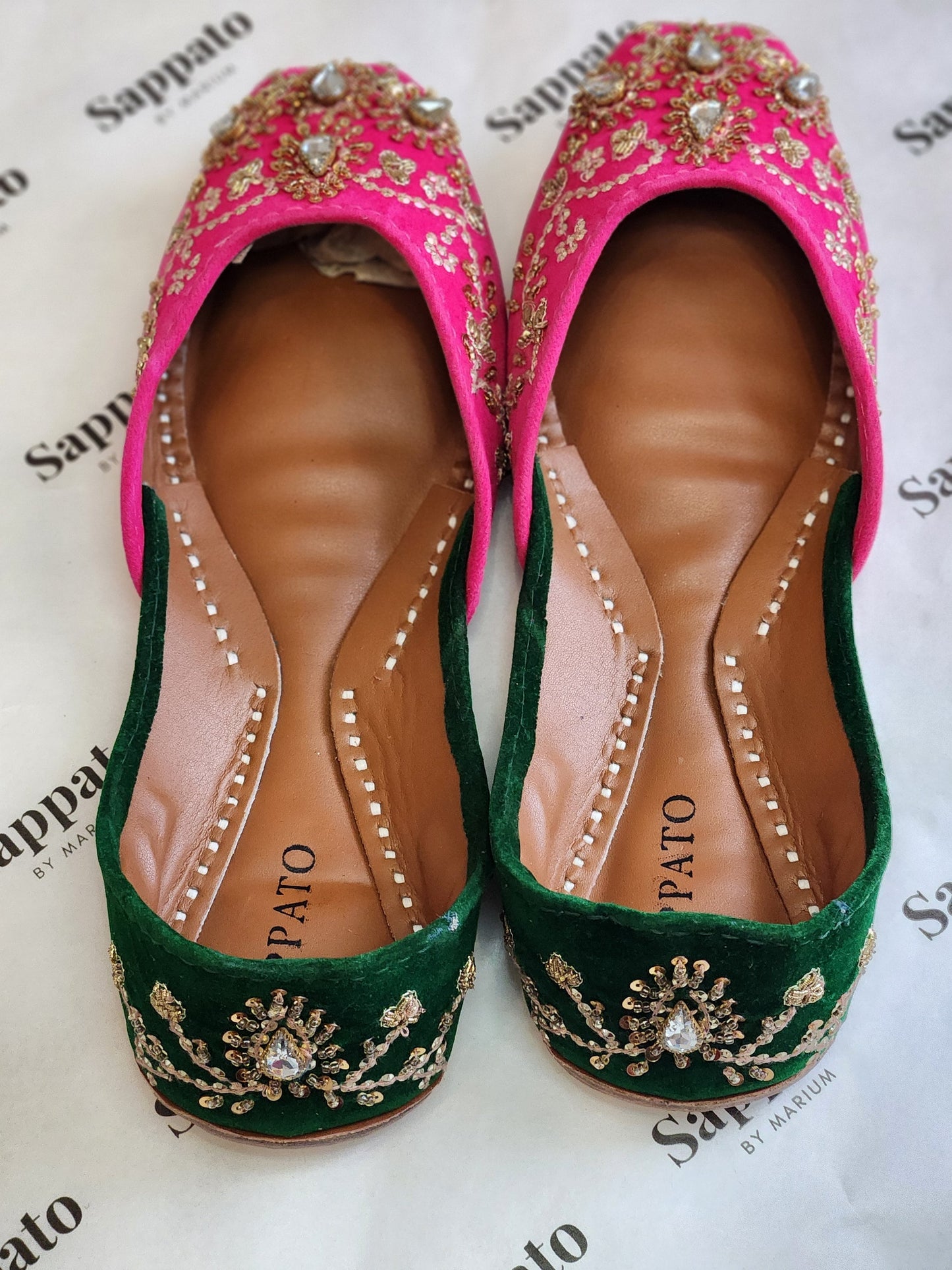 Pink and green velvet khussa.