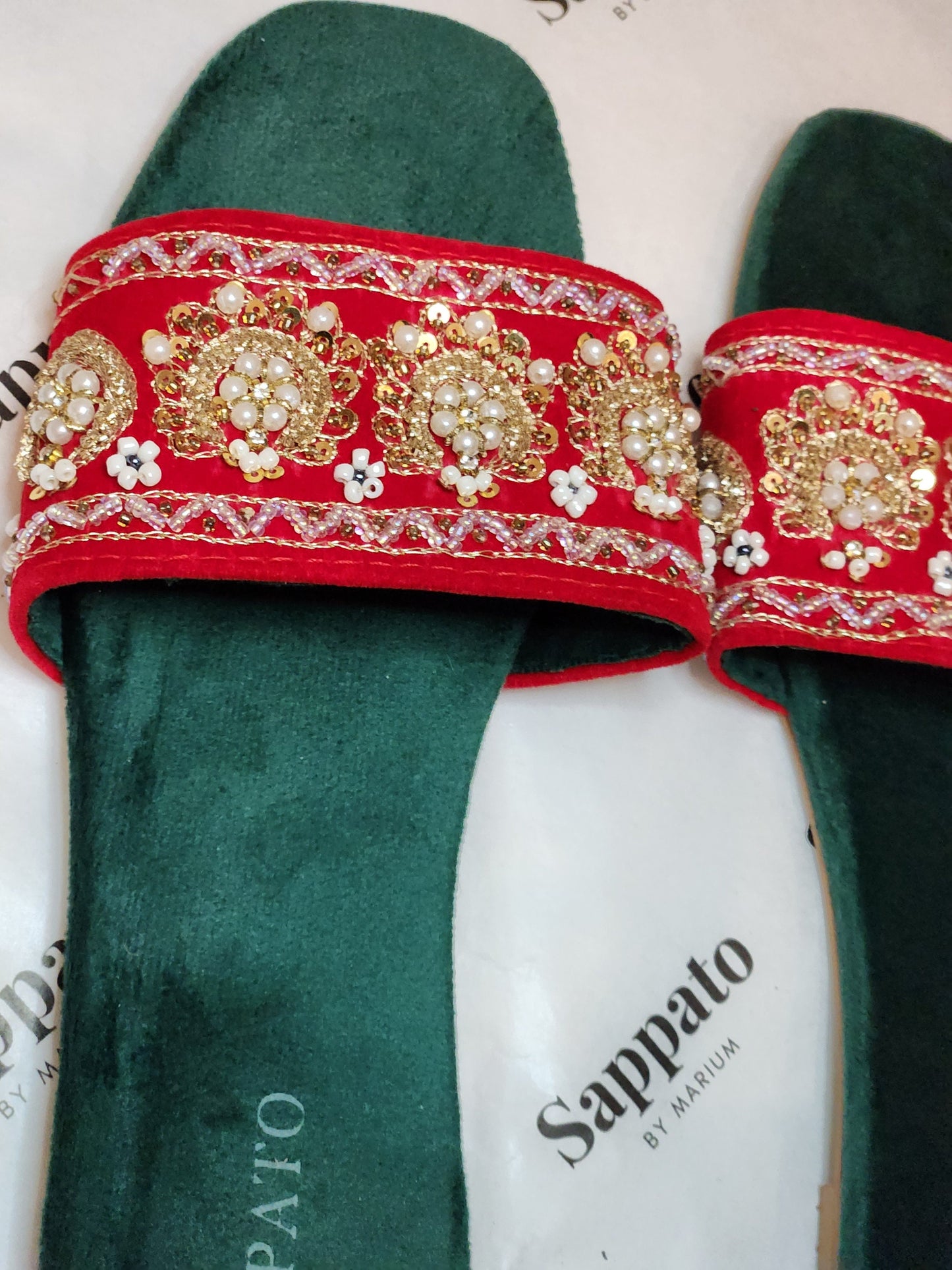 Maharani red chappal.