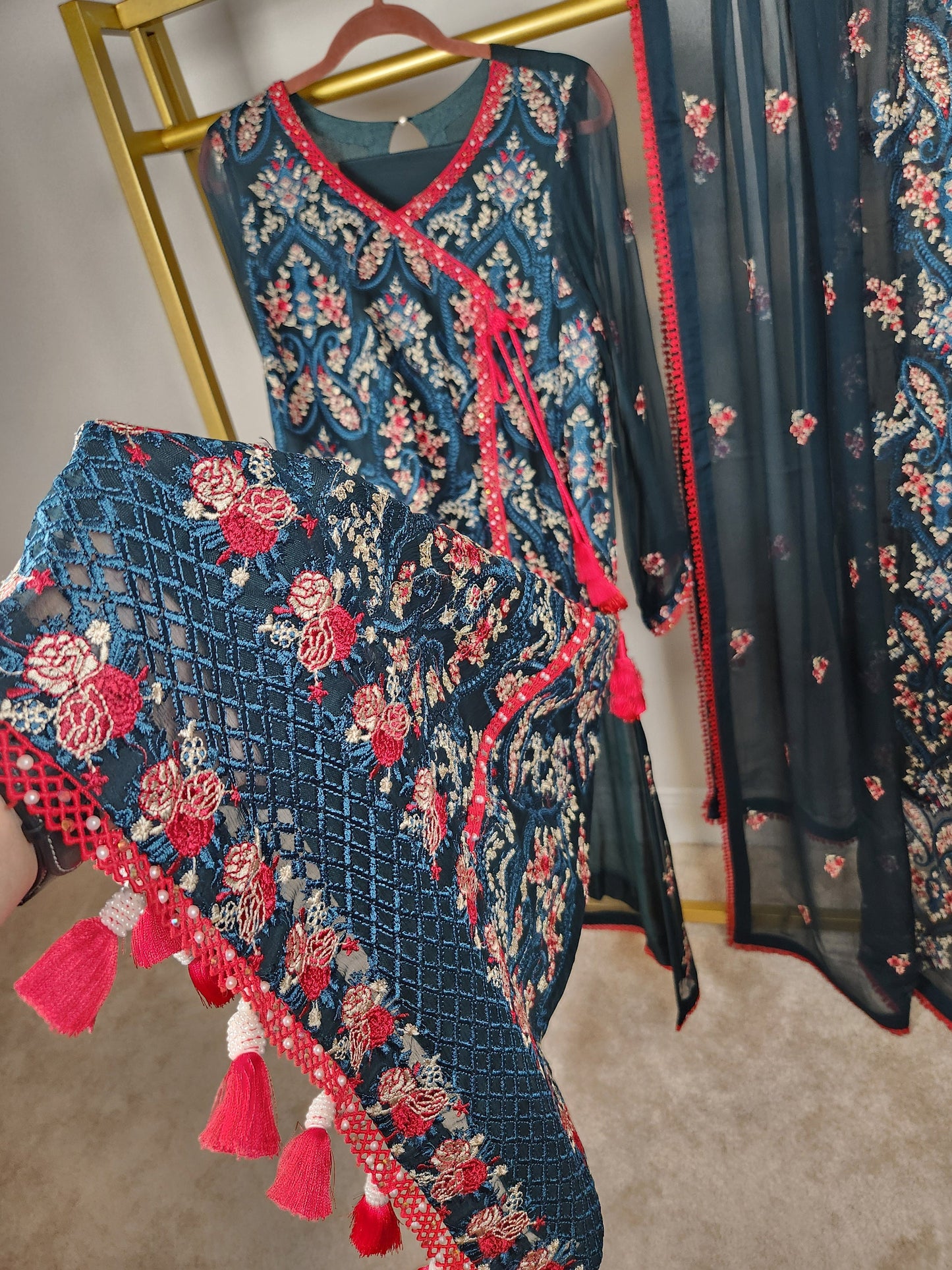 Blue chiffon with multicolored chikankari.