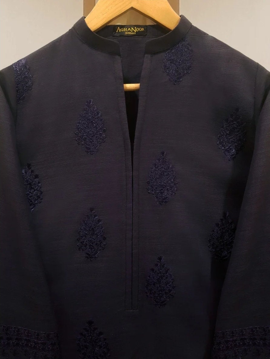 3 pc embroidered khaddar suit.